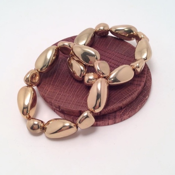 Pair Of Gold Stone Shaped Stretchy Bracelets - Picture 2 of 2